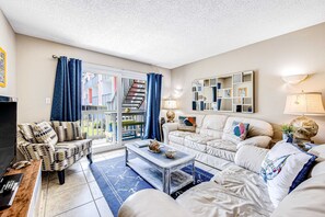 TV, offices - Convenient condo near beach with pool, balcony, & W/D - snowbird-friendly (Pensacola Beach)