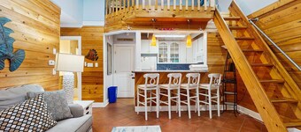 Cozy coastal condo with loft, shared pool and beach access