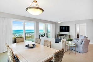 TV, fireplace, offices - Blu 301 - Third-floor, Gulf-view condo with pool and hot tub access, central AC, & W&D (Fort Walton Beach)