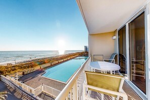 Outdoor dining - Beach Chic Condo On Okaloosa Island Gulfside Pool & Exercise Room (Fort Walton Beach)