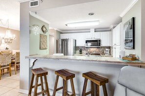 Fridge, microwave, oven, stovetop - 4th Floor Bayfront Condo With Private W/D & Shared Outdoor Pool (Pensacola Beach)