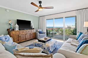 TV, offices - Ocean view condo with high-speed WiFi, balcony, shared pool, & beach access (Miramar Beach)