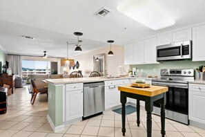 Fridge, microwave, oven, stovetop - Ocean view condo with high-speed WiFi, balcony, shared pool, & beach access (Miramar Beach)