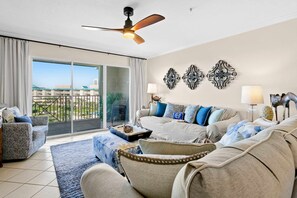 TV, offices - Ocean view condo with high-speed WiFi, balcony, shared pool, & beach access (Miramar Beach)