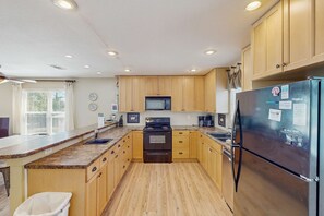 Fridge, microwave, oven, stovetop - Charming dog-friendly home near the Bay with a pool, washer/dryer & central AC (St. George Island)