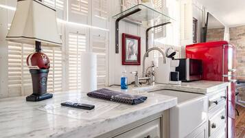 Microwave, coffee/tea maker, cookware/dishes/utensils