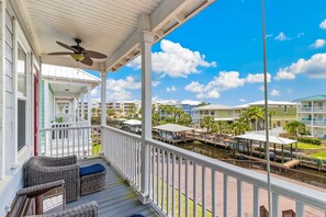 Terrace/patio - Gulf & canal views with modern amenities, pool, & beach access (Mexico Beach)