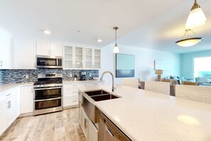 Fridge, microwave, oven, stovetop - Blu 406 - Gulf-front condo in gated community with pools on site - close to beach (Fort Walton Beach)