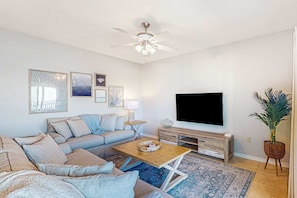 TV, offices - Sunlit & tropical beachfront condo with pool, gym, balcony views (Pensacola Beach)