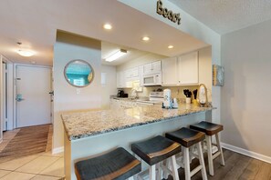 Fridge, microwave, oven, stovetop - Sea Oats 410 - Beachfront condo with Gulf views, beach access, pool, & private balcony (Fort Walton Beach)