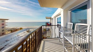 A balcony with a view of the beach and ocean. - Sea Oats 708 - 7th floor condo in beachfront complex with pool, Gulf view, W&D, & fast WiFi (Fort Walton Beach)
