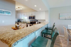 Fridge, microwave, oven, stovetop - Sea Oats 708 - 7th floor condo in beachfront complex with pool, Gulf view, W/D, & fast WiFi (Fort Walton Beach)