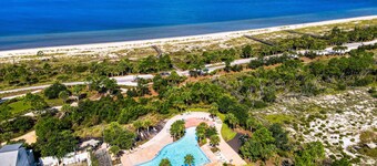 2 dog-friendly beach homes with on-site pool, shopping, dining, AC, & WD