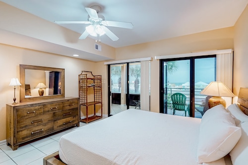 Beachfront condo with pool, Gulf-view balcony, central AC, & washer/dryer