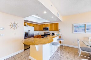 Fridge, microwave, oven, stovetop - Spacious coastal condo on Okaloosa Island with Gulf-front views - steps to beach (Fort Walton Beach)