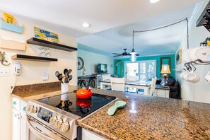 Fridge, microwave, oven, stovetop - Inviting waterfront townhome with full kitchen, balcony, central AC, & W&D (Pensacola Beach)