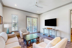 TV, offices - Lake-view condo with a pool, hot tub, & balcony - walking distance to beach (Santa Rosa Beach)