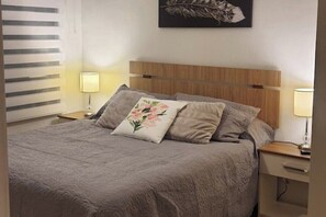 2 habitaciones, tabla de planchar con plancha, wifi y ropa de cama 