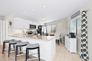 Fridge, microwave, oven, stovetop - Ground Floor Condo with Onsite Pool View & Access, Patio, Central AC, & WiFi (Miramar Beach)