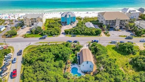 A coastal hotel with a swimming pool, beach access, and multiple parking areas. - Dog-friendly, Gulf-view home with pool, decks, WiFi, & WD - walk to beach (Santa Rosa Beach)