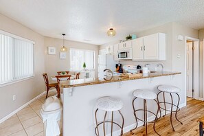 Fridge, microwave, oven, stovetop - Miramar Beach condo with heated pool on-site, private balcony, washer&dryer, AC (Miramar Beach)