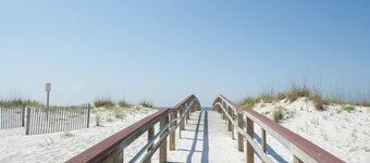 Inviting condo with bay & ocean views, & pool - steps to the beach