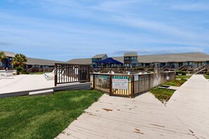 Exterior - Comfortable townhome steps from beach with pool access, balcony, & W/D (St. George Island)