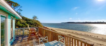 Beachfront dune cottage with deck & view of St Vincent Island