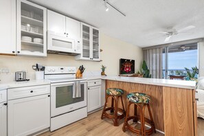 Fridge, microwave, oven, stovetop - Kailua Village#604 High Floor, Gorgeous Remodeled 1 bedroom, in Heart of Town (Kailua Kona)