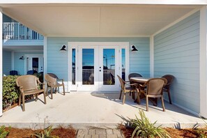 Outdoor dining - Beachfront condo with private balcony, shared pool/hot tub/BBQ (Miramar Beach)