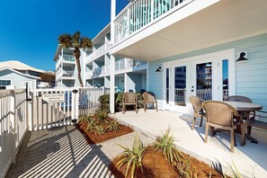 Outdoor dining - Beachfront condo with private balcony, shared pool/hot tub/BBQ (Miramar Beach)