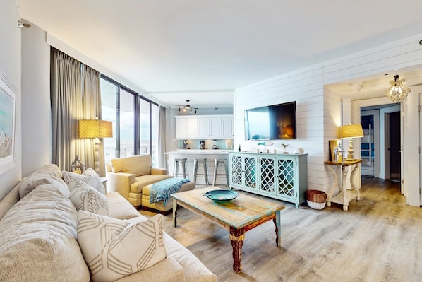 TV, offices - Cheerful 10th Floor Condo with Shared Pool & Hot Tub, WiFi, and Central AC (Miramar Beach)