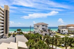 Exterior - Waterfront corner condo w/ shared pool, pool spa, fitness room, & beach service (Miramar Beach)