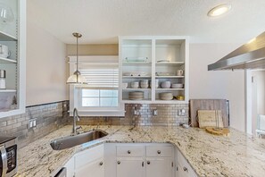 Fridge, microwave, oven, stovetop - Bright home near the beach with enclosed patio, grill, outdoor shower, W/D, AC (Santa Rosa Beach)