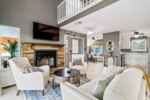 TV, fireplace, offices - Lovely home with sound view, balcony, full kitchen, central AC, & washer/dryer (Navarre Beach)