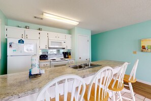 Fridge, microwave, oven, stovetop - Beachfront condo with true beachfront walkout, patio, BBQ area, & Gulf view (Panama City Beach)