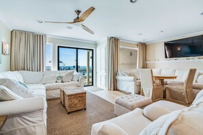 TV, offices - Cozy coastal condo with shared pool, Hot tub and easy beach access (Panama City Beach)