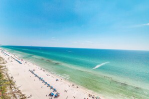 On the beach - Sun-soaked oceanfront escape with pool, hot tub, central AC, & tennis court (Panama City Beach)
