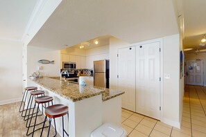 Fridge, microwave, oven, stovetop - Beautiful condo with beach access, shared pool, WiFi, and panoramic views (Panama City Beach)
