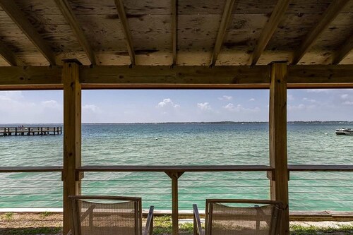 Cozy coastal condo with water view, pool, central A/C, & easy beach access