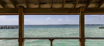 Cozy coastal condo with water view, pool, central A/C, & easy beach access