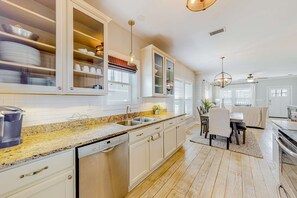 Fridge, microwave, oven, stovetop - Charming home with enclosed sunroom, porch, central AC, & W&D - near beach (Santa Rosa Beach)