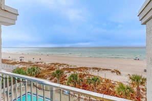 On the beach - Dog-friendly beachfront condo with pool, hot tub, AC, & Gulf views (Panama City Beach)