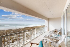 A balcony with a view of the beach and ocean. - Updated 3rd floor condo w/ beach access and complementary BEACH SERVICE (Navarre Beach)