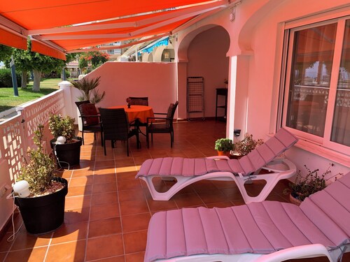 Charming Beachfront Bungalow in Torrox Costa - Perfect Family Retreat