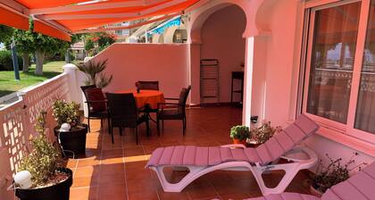 Charming Beachfront Bungalow in Torrox Costa - Perfect Family Retreat