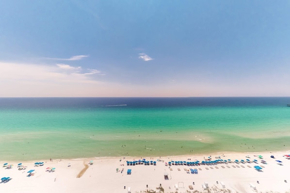 On the beach - Lovely coastal condo with water views, pool, hot tub, private balcony & W/D (Panama City Beach)