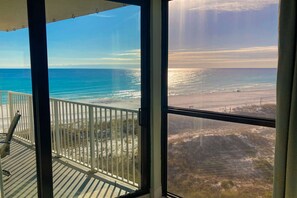 A balcony with a view of the beach and ocean. - 3rd Floor condo, 2 beach chairs included, Close to dining (Miramar Beach)