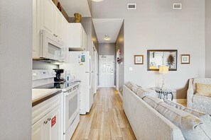 Interior - Spacious condo with large living area, private balcony & shared pool (Santa Rosa Beach)