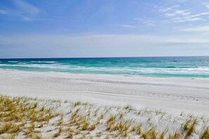 A beach with white sand and ocean waves. - Majestic Sun A307 Beachfront Condo, Gulf Views! (Miramar Beach)
